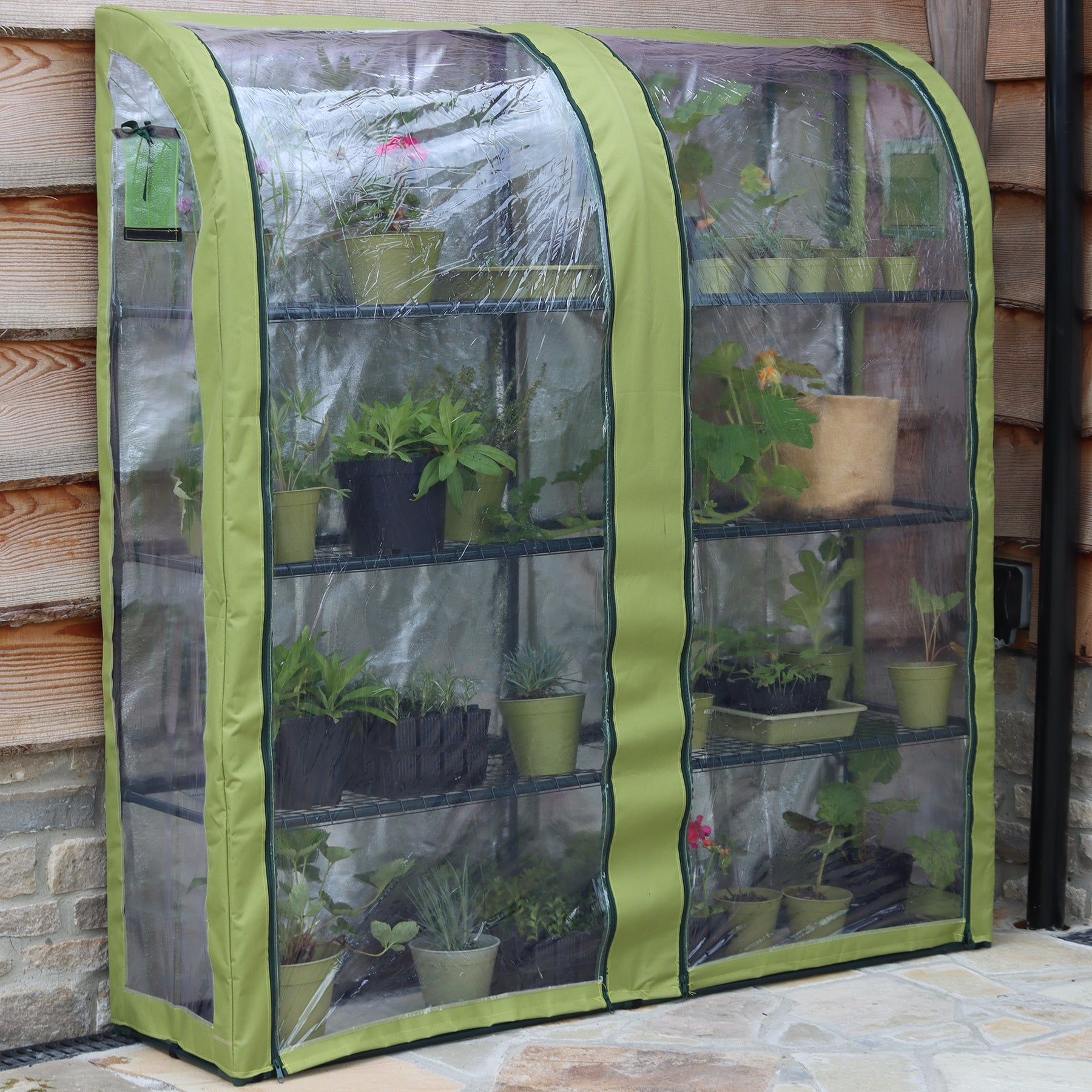 Double Light-Booster Plant House with reflective backing and micromesh vents for optimal plant growth.