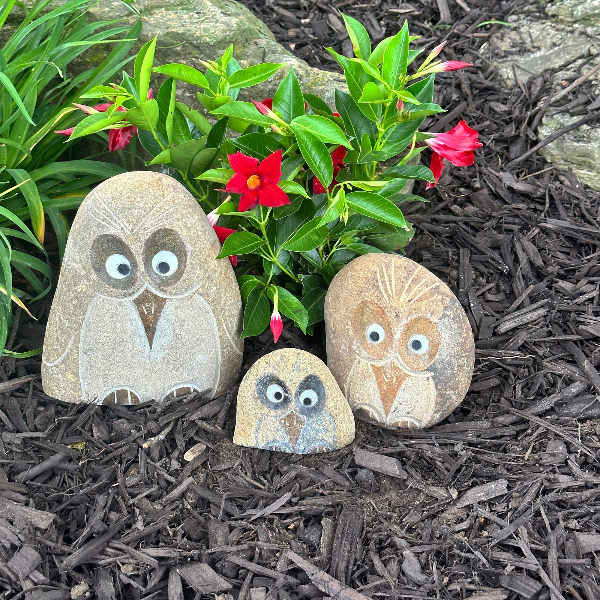 Hand-carved granite boulder Angry Birds sculptures, 3-piece set in garden.