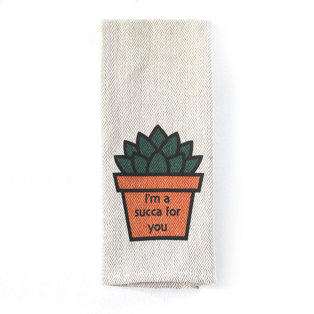 Eco-friendly khaki kitchen tea towel featuring a succulent design and text &quot;I&#39;m a Succa for You.&quot;