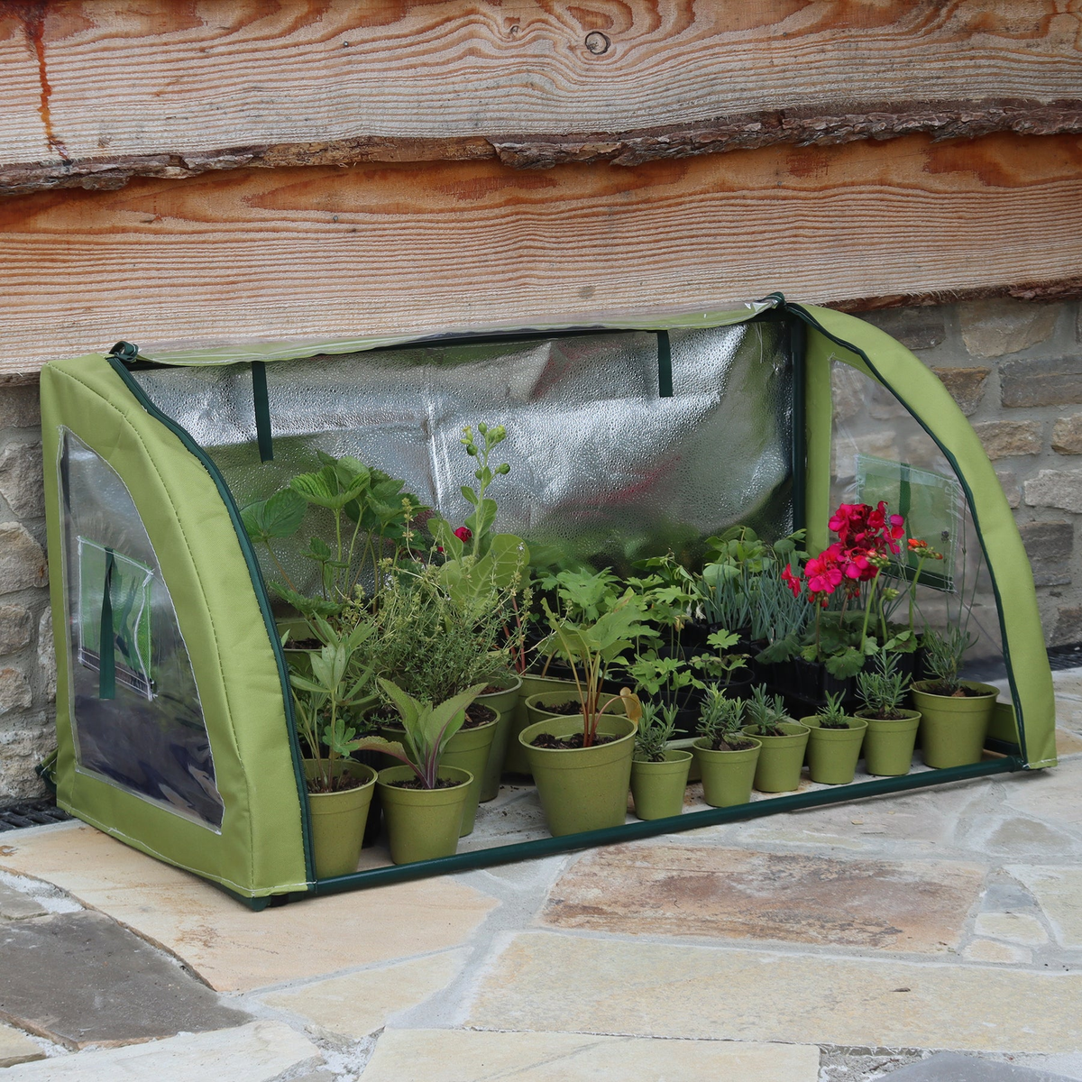 Light-Booster Coldframe for potted plants, featuring reflective backing and micromesh vents for optimal growth and protection.