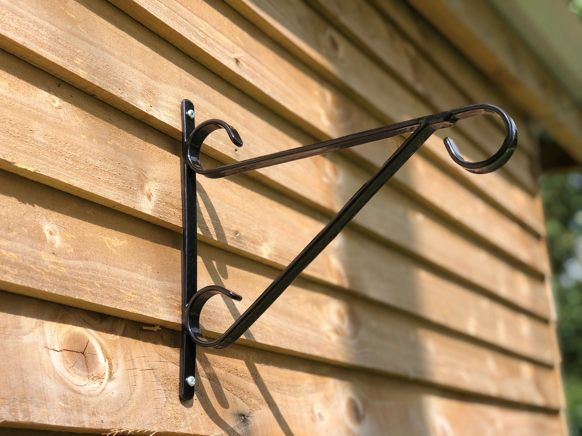 Multipurpose outdoor metal wall hook for garden, sturdy support for hanging baskets and ornaments, 0.5"W x 14"D x 12"H.