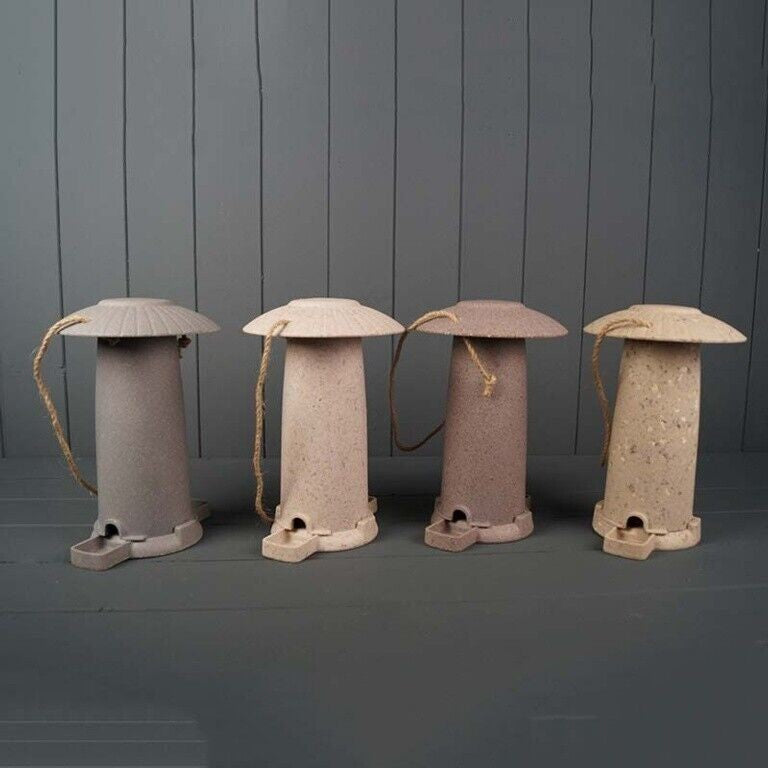 Earthy Sustainable Seed Feeder made from straw, eco-friendly and vegan, suitable for indoor and outdoor use.