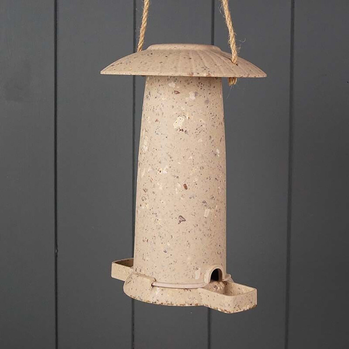 Earthy Sustainable Seed Feeder made from coffee husks, frost-proof, vegan-friendly.