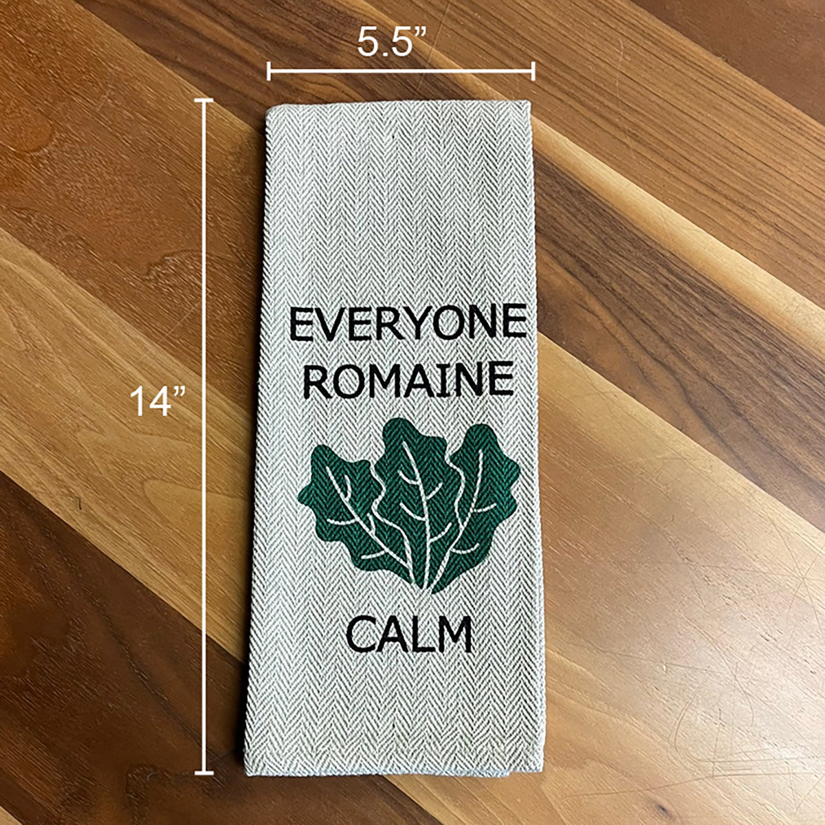 Kitchen Tea Towel with &quot;Everyone Romaine Calm&quot; design in neutral khaki, folded size 5.5&quot; x 14&quot;.