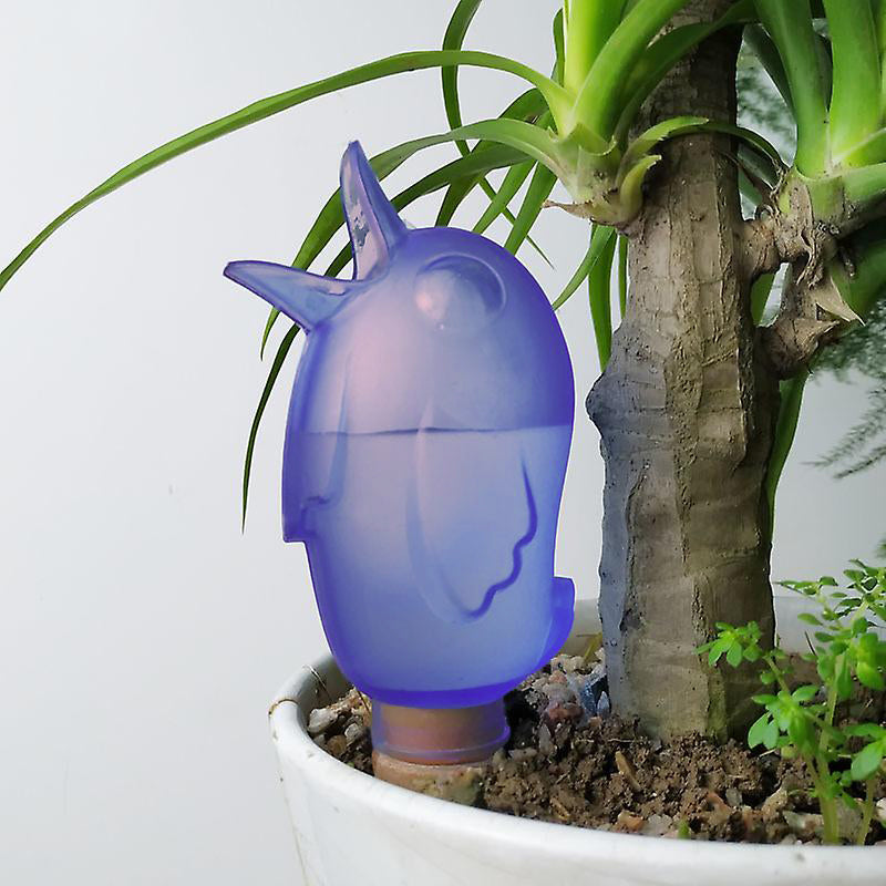 Purple Bordy Water Reserve in a plant pot, UV-resistant plastic, waters indoor and outdoor plants.