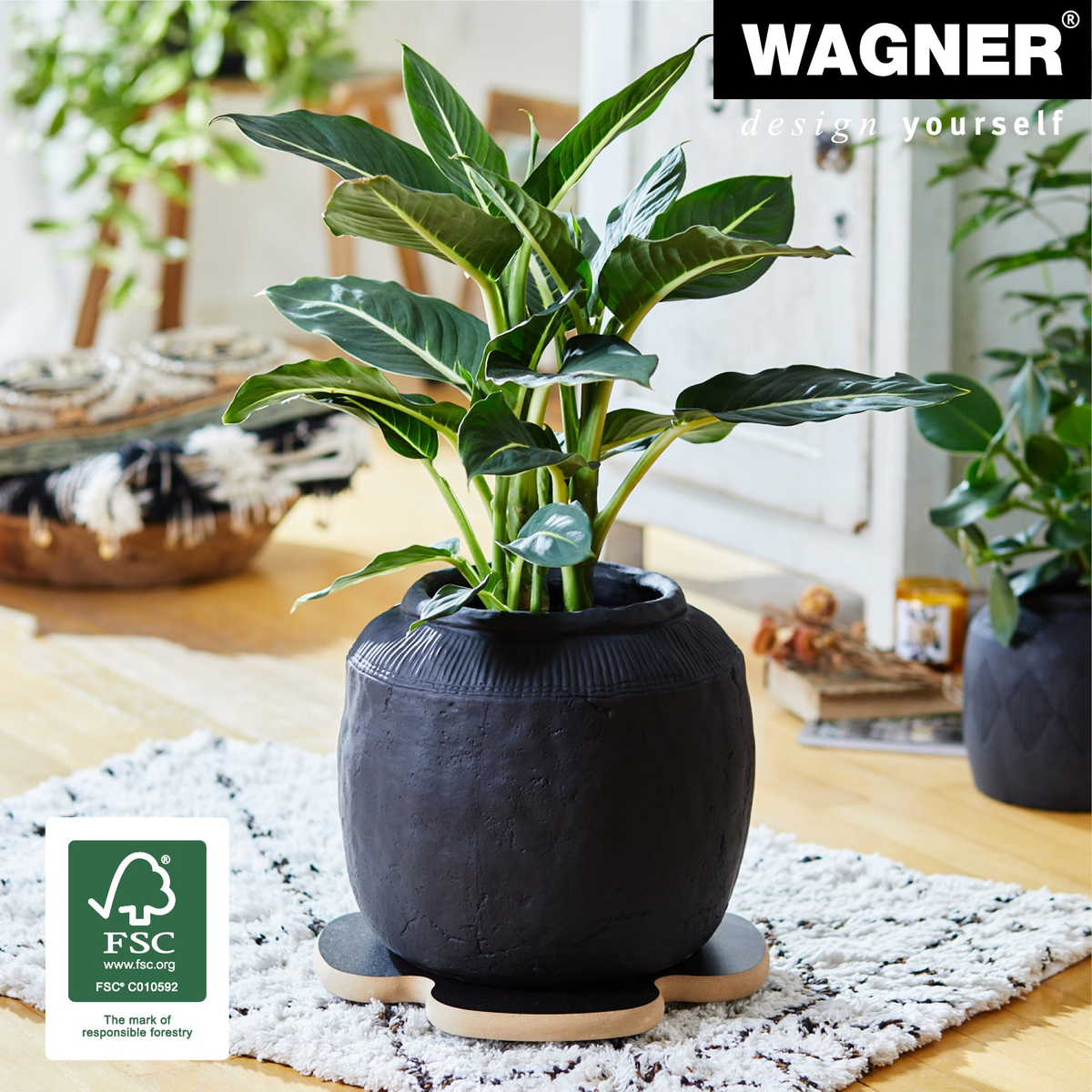 13&quot; Black Clover Decor Indoor Plant Caddy with swivel casters, MDF construction, supports 220 lbs, designed for smooth movement on all floor types.