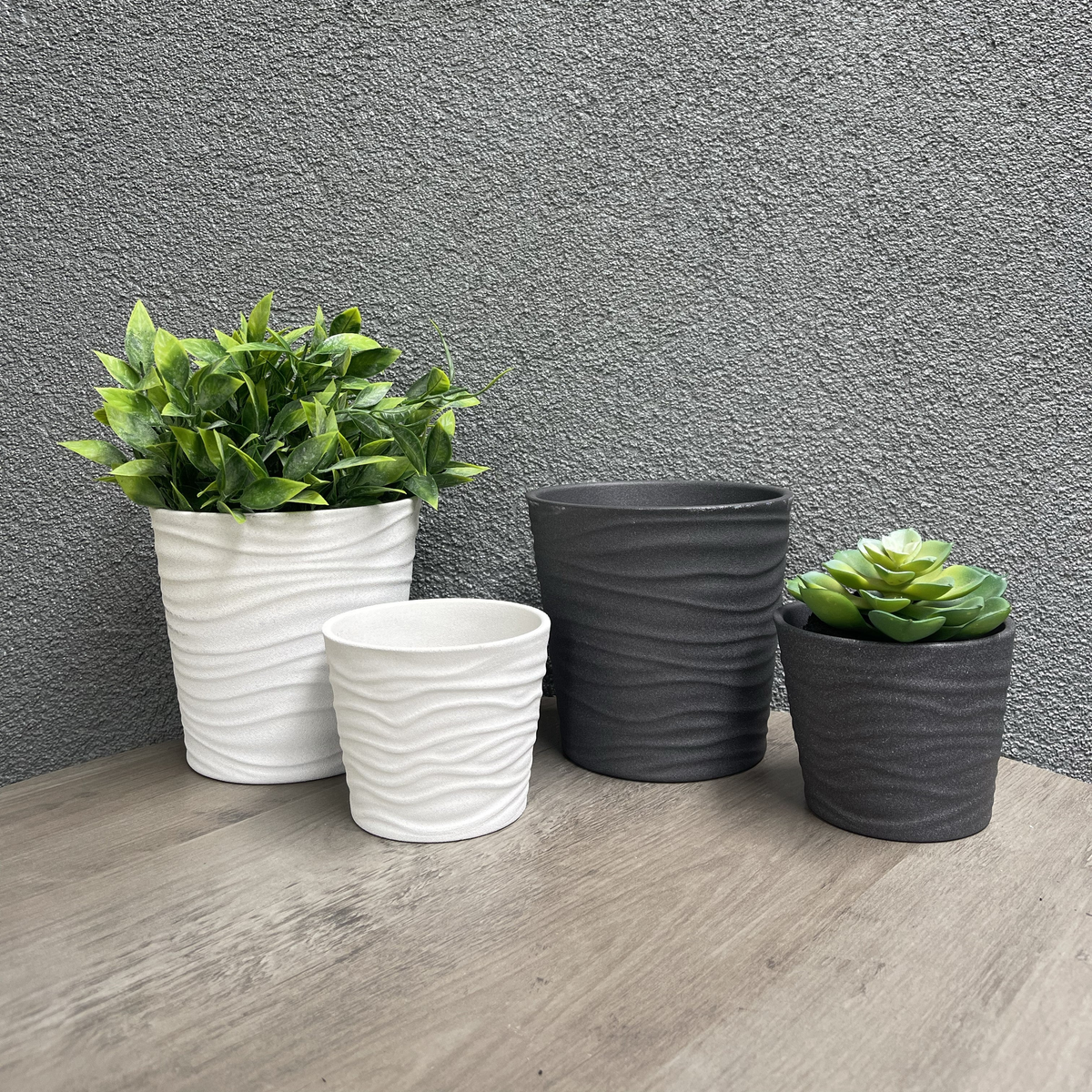 4-piece indoor ceramic plant pot set, 5.5&quot; and 3.9&quot; diameter, white and anthracite, matte finish.