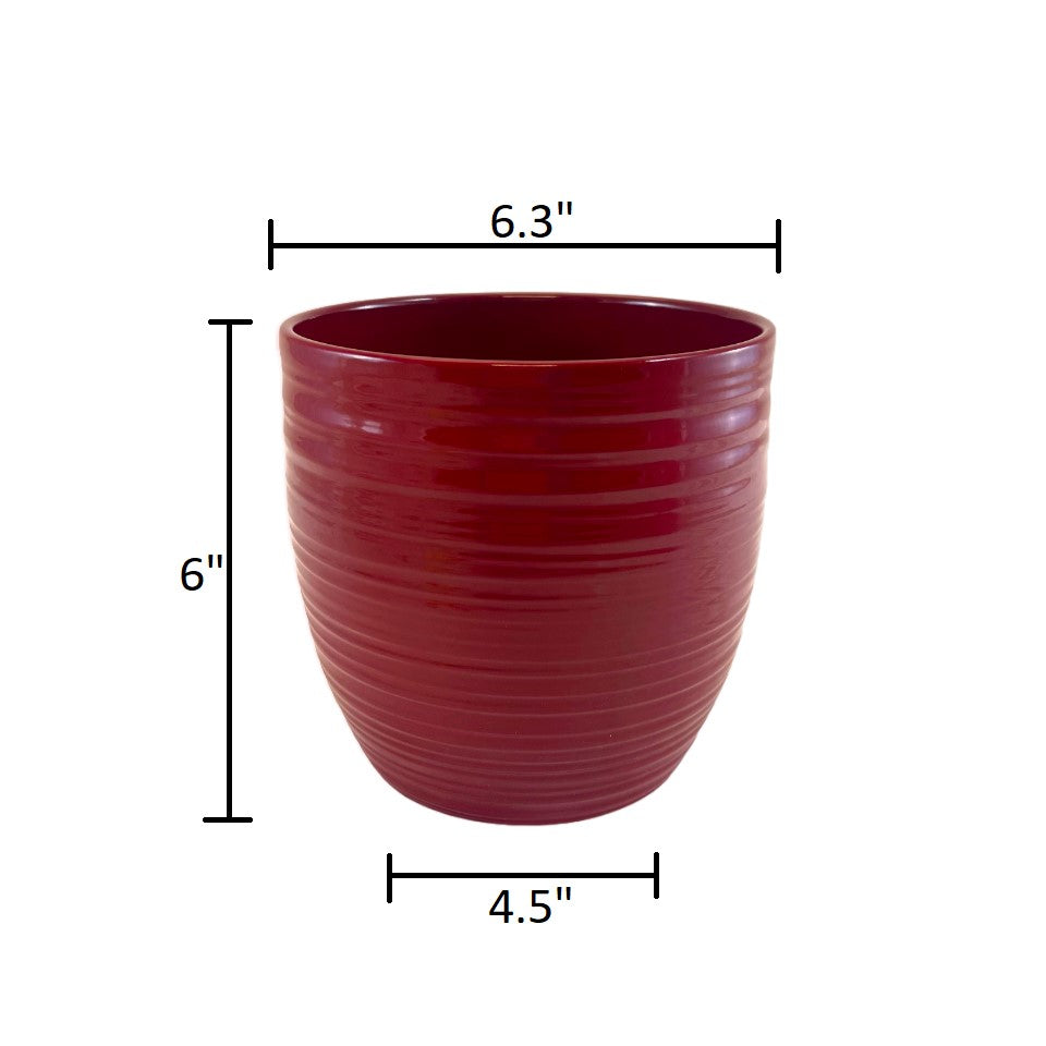 6.3&quot; diameter red ceramic indoor plant pot, stylish glazed finish with ridges, water-resistant design.