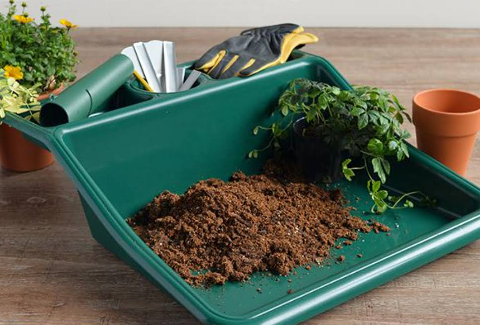 Green compact tidy tray with integrated shelf, ideal for gardening, measuring 19&quot; x 19.5&quot; x 6&quot;.