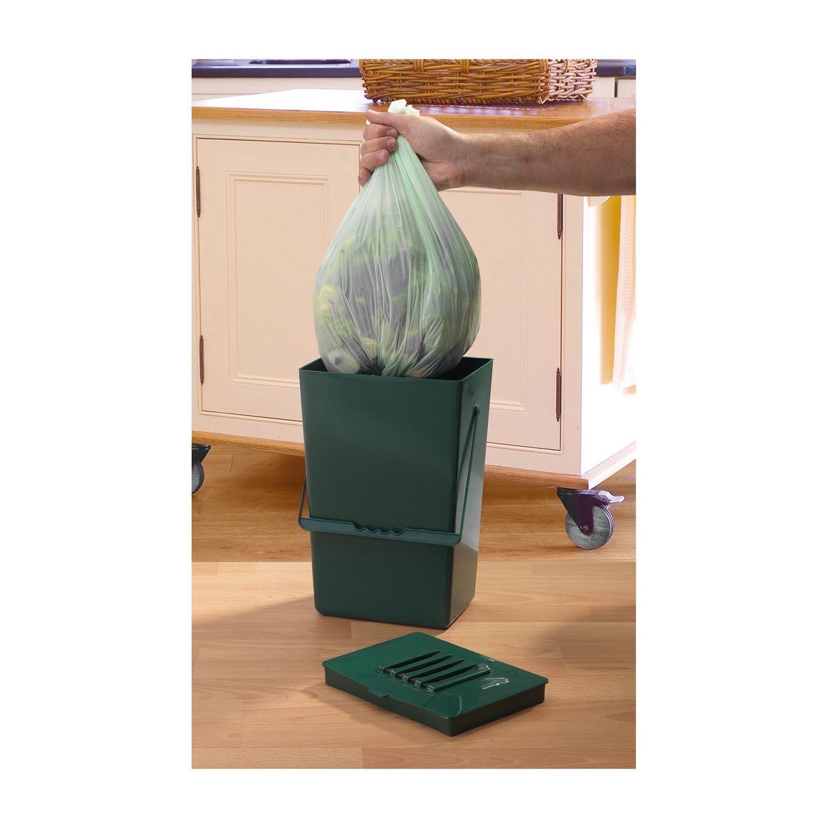 Biodegradable caddy liners in use for Midi compost caddy, eco-friendly waste disposal, 20-pack.