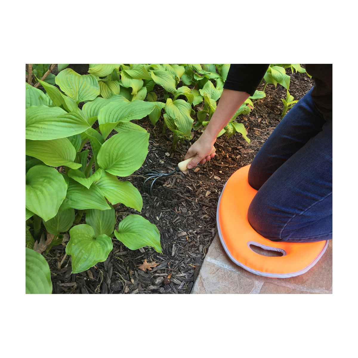 Orange Multipurpose Memory Foam Kneeling Cushion in garden use.