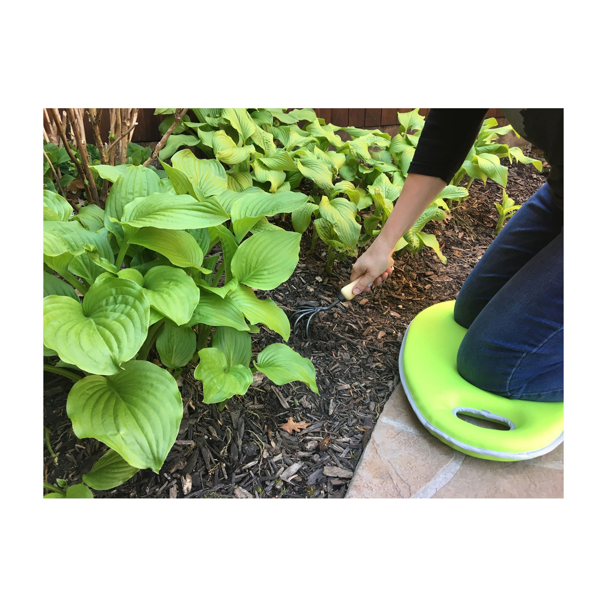 Green multipurpose memory foam kneeling cushion in use for gardening, 20&quot;L x 12.25&quot;W.