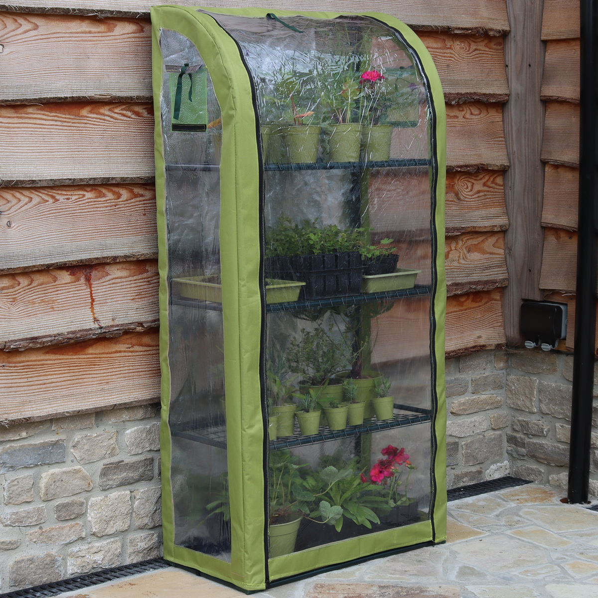 Single Light-Booster Plant House with reflective backing and zippered front, ideal for potted plants.