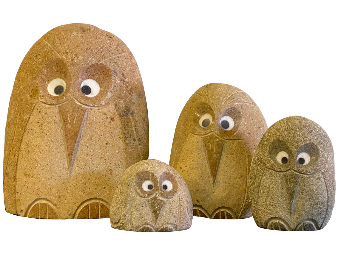 Hand-carved natural granite boulder stone Angry Birds sculptures in four sizes with inlaid quartz eyes.