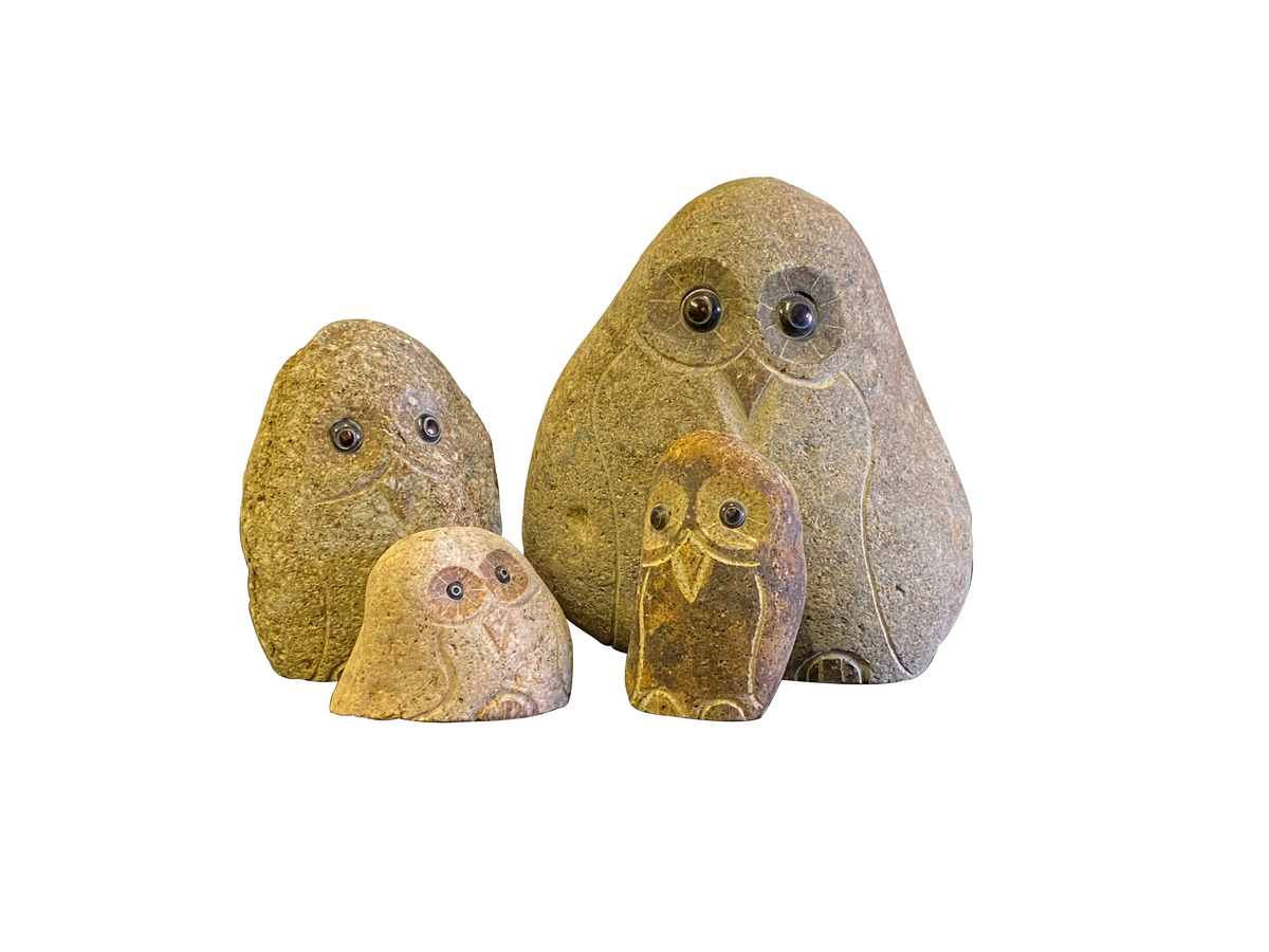 Hand-carved granite boulder stone owl family set, 4 pieces, natural garden decor.