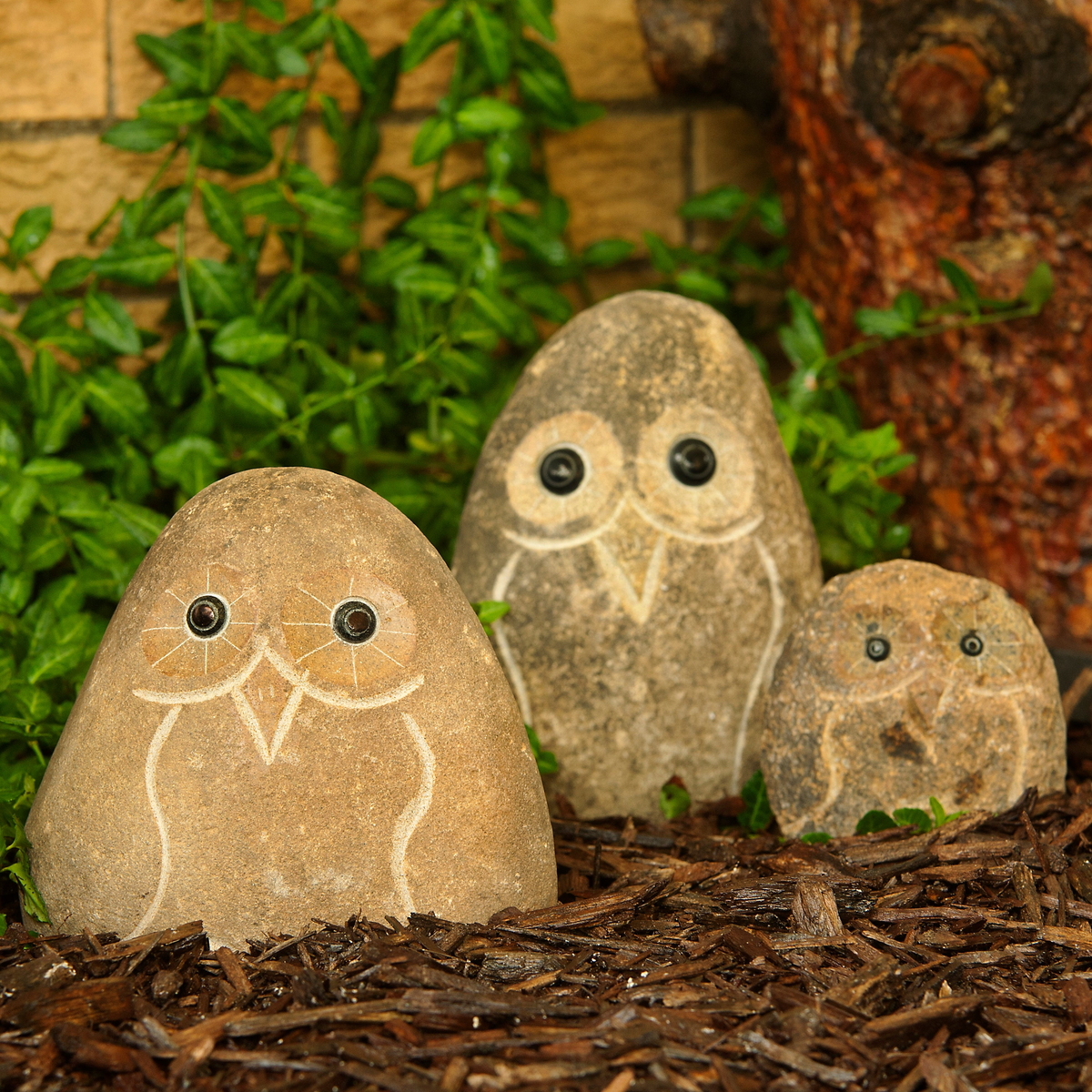 Hand-carved natural granite stone owl statues in three sizes (4&quot;, 6&quot;, 8&quot;) for garden decoration.