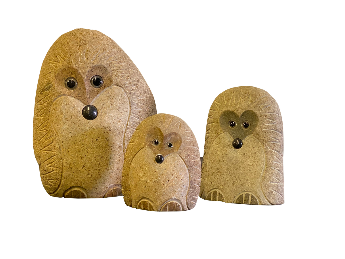 Hand-carved granite boulder hedgehog family set of three, eco-friendly garden decor.