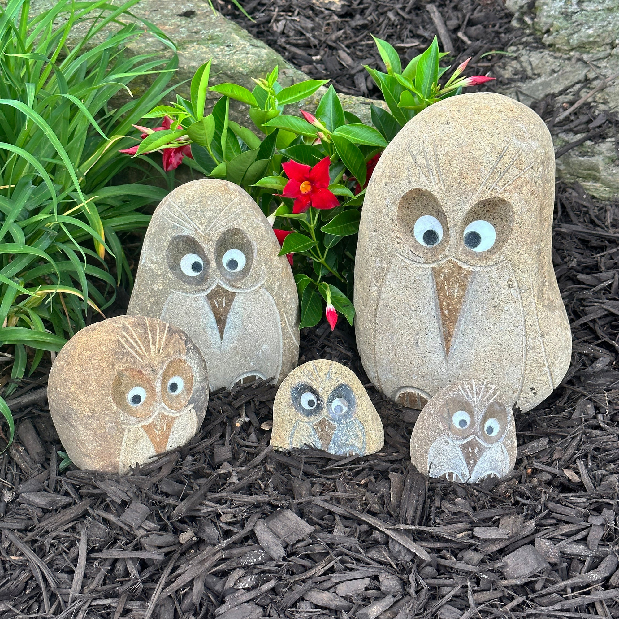 Hand-carved granite boulder Angry Birds sculptures in garden setting, set of 5, featuring unique quartz eyes.