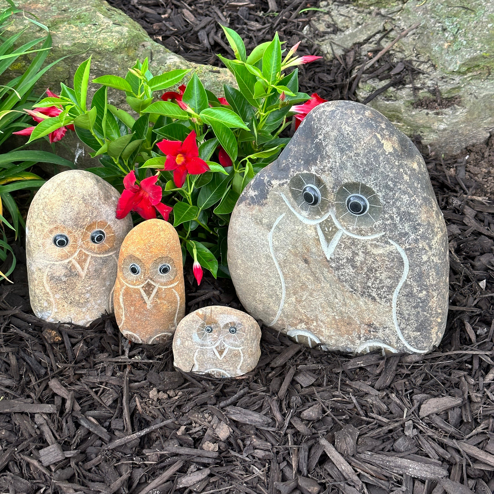 Hand-carved natural granite stone owl sculptures in various sizes, enhancing garden decor with unique details.