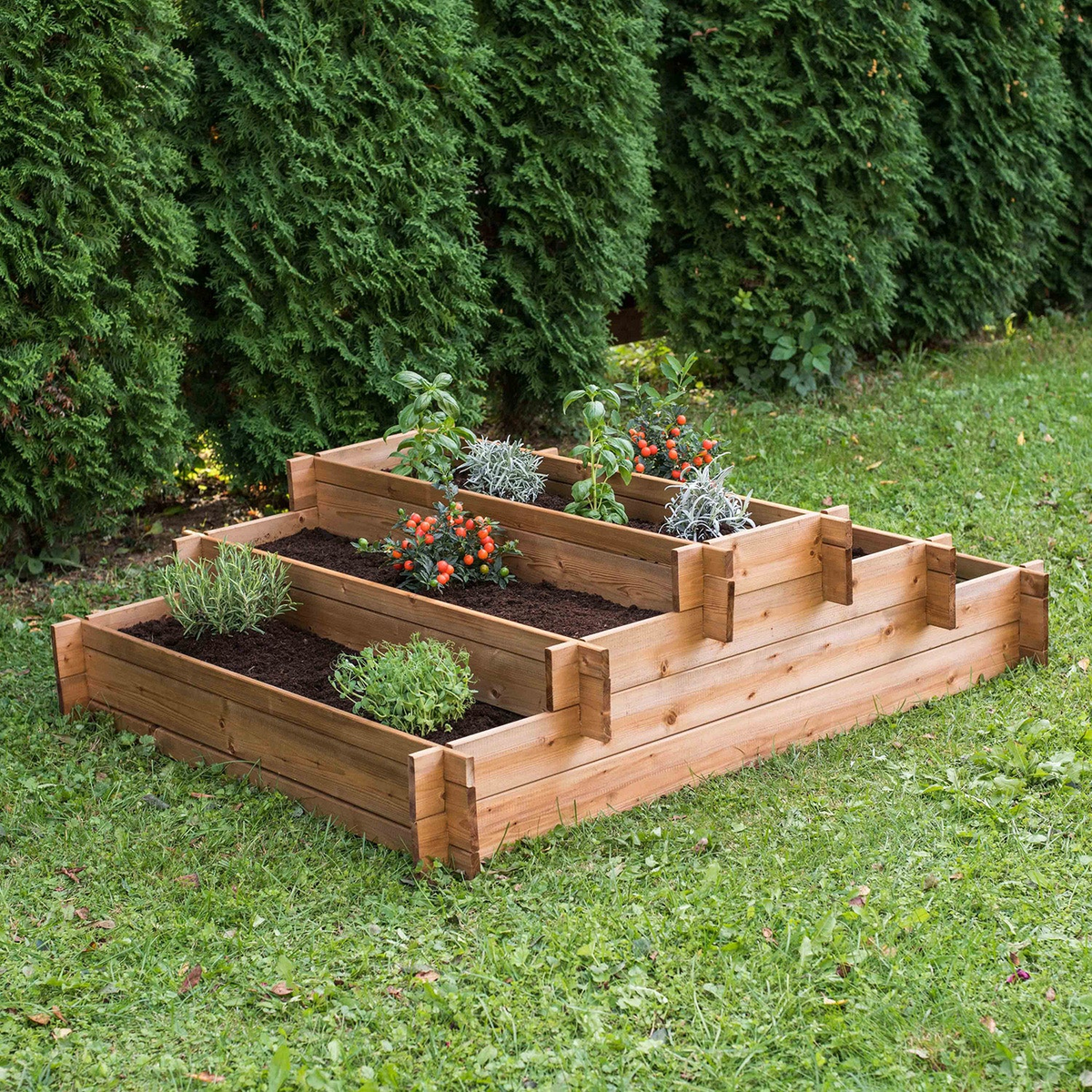 Tiered five-section wooden raised garden bed for improved soil drainage and reduced back strain.